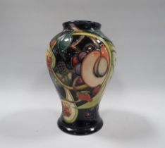 A MOORCROFT QUEENS CHOICE PATTERN VASE, impressed and painted marks to base, H 15.5 cm