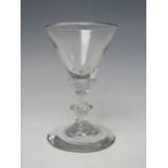 AN 18TH CENTURY WINE GLASS, with conical shaped bowl, three ring annulated knop stem with single