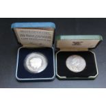 A SILVER NATIONAL TRUST MEDAL, together with a Royal Wedding silver proof coin, both cased (2)