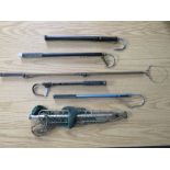 A SELECTION OF ANTIQUE AND VINTAGE HARDY FISHING GAFFS. complete with landing net