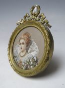 A LATE 19TH / EARLY 20TH CENTURY CIRCULAR PORTRAIT MINIATURE OF QUEEN VICTORIA, indistinctly