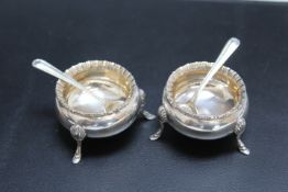 A PAIR OF HALLMARKED SILVER SALT DISHES BY ATKIN BROS - SHEFFIELD 1903, together with a matched pair