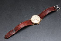 OMEGA - A HALLMARKED 9 CARAT GOLD WRIST WATCH, on replacement leather strap and with Omega box,