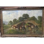 CIRCLE OF THOMAS SIDNEY COOPER (1803-1902). Cattle and sheep watering beside a bridge , bears