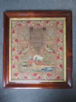 A 19TH CENTURY ENGLISH NEEDLEWORK SAMPLER BY HANNAH ROBINSON AGED 12, 1855, a floral border with