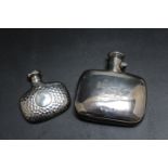 A HALLMARKED SILVER HIP FLASK BY RICHARDS & BROWN, date letter indistinct, together with a smaller
