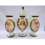 A VICTORIAN GREEN GLASS VASE GARNITURE SET, having female / maiden portrait decoration and gilded