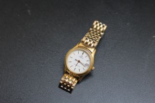 OMEGA - A LADIES SEAMASTER, with date window and on gold plated strap, Dia 2.5 cmCondition Report: