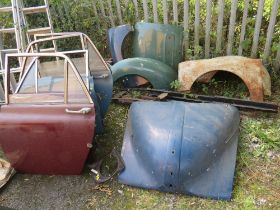 A SELECTION OF VINTAGE CAR BODY PANELS, to include four painted doors, Morris Minor bonnet, boot, da