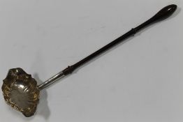A 19TH CENTURY HALLMARKED SILVER LADLE, with turned wooden handle, overall L 32 cm