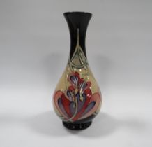 A MOORCROFT BLEEDING HEARTS PATTERN BUD VASE, impressed and painted marks to base, H 17 cm