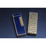 A BLUE ENAMEL AND GOLD PLATED DUNHILL LIGHTER, together with another, H 6.5 cm (2)
