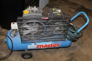 AN AIRMASTER AIR COMPRESSOR