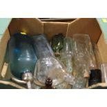 A TRAY OF ASSORTED GLASS BOTTLES ETC TO INCLUDE A SODA SYPHON