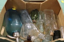 A TRAY OF ASSORTED GLASS BOTTLES ETC TO INCLUDE A SODA SYPHON