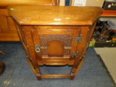 A SMALL OLD CHARM OAK CARVED HALL CUPBOARD