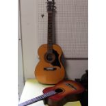 A VINTAGE ACOUSTIC GUITAR TOGETHER WITH A SMALL UNSTRING EXAMPLE (2)