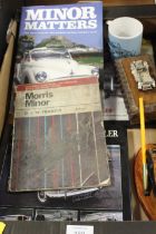 A TRAY OF ASSORTED MORRIS MINOR COLLECTABLES TO INCLUDE ILLUSTRATED CAR SERVICING SERIES FOR OWNER