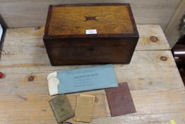 AN ANTIQUE OAK BOX AND CONTENTS TO INCLUDE SOLDIERS PAY BOOK