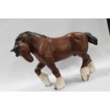 A BESWICK MODEL OF A WALKING SHIRE HORSE IN MATT FINISH