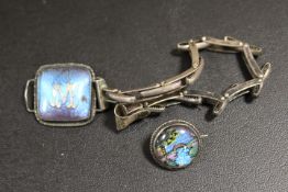 A VINTAGE SILVER AND BUTTERFLY WING BRACELET TOGETHER WITH A BROOCH
