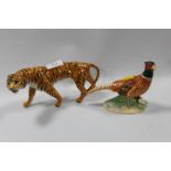 A BESWICK MODEL OF A TIGER TOGETHER WITH A MODERN MODEL OF A PHEASANT