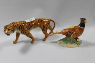 A BESWICK MODEL OF A TIGER TOGETHER WITH A MODERN MODEL OF A PHEASANT