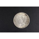 A 1923 SILVER DOLLAR