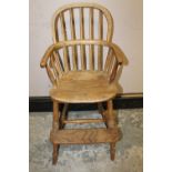 A CHILDS ANTIQUE WINDSOR STYLE HOOP BACK HIGH CHAIRCondition Report:With historic evidence of worm