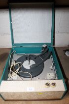 A MONARCH VINTAGE RECORD PLAYER