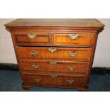A 19TH CENTURY OAK CHEST OF FIVE DRAWERS, each drawer with crossbanded mahogany detailing, raised on
