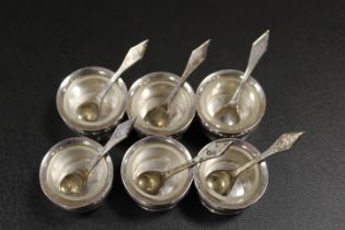 SIX BOWLS AND SPOONS WITH LINERS
