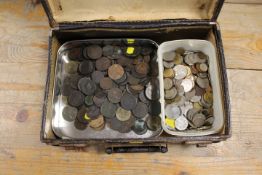 A SMALL LEATHER SUITCASE CONTAINING COLLECTABLE COINAGE