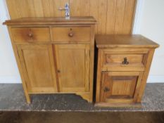 A SLIM OAK HALL CUPBOARD TOGETHER WITH A COLONIAL CABINET (2) (FOYER)