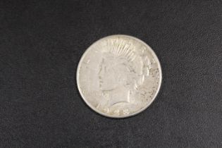 A 1923 SILVER DOLLAR