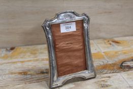 AN ANTIQUE HALLMARKED SILVER PICTURE FRAME