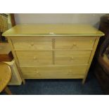 A MODERN LIGHT OAK FIVE DRAWER CHEST WITH GLASS TOP - W 110 cm