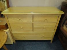 A MODERN LIGHT OAK FIVE DRAWER CHEST WITH GLASS TOP - W 110 cm