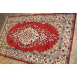 A VINTAGE NORTHERN INDIAN WOOLLEN RUG FROM JAIPUR - APPROX 160 x 90 cm