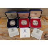 THREE SILVER PROOF CROWNS