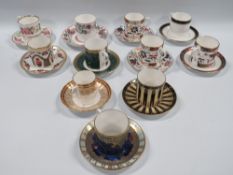 A COLLECTION OF ELEVEN ROYAL WORCESTER COFFEE CANS AND SAUCERS, to include a selection reproduced