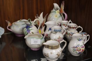 A COLLECTION OF FRANZ PORCELAIN TOGETHER WITH A SELECTION OF ROYAL WORCESTER JUGS MANY WITH BOXES