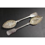 A MATCHED PAIR OF HALLMARKED SILVER BERRY SPOONS