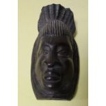 A VINTAGE CARVED TRIBAL WALL MASK