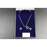 A 9CT GOLD SAPPHIRE AND DIAMOND NECKLACE WITH SIMILAR MATCHED EARRINGS