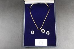 A 9CT GOLD SAPPHIRE AND DIAMOND NECKLACE WITH SIMILAR MATCHED EARRINGS