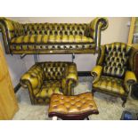 A VINTAGE LEATHER CHESTERFIELD SETTEE , CHAIR AND WING CHAIR WITH STOOL (4)
