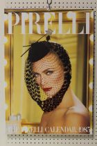 A SELECTION OF VINTAGE PIRELLI CALENDARS