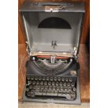 A CASED PORTABLE "THE GOOD COMPANION" IMPERIAL TYPE WRITER