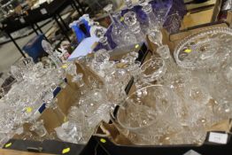 FIVE TRAYS OF CUT GLASS ETC TO INCLUDE OF A LARGE QUANTITY OF ASSORTED DECANTERS